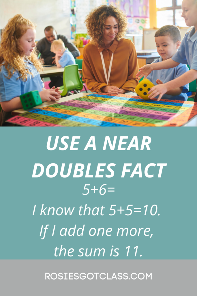 teacher at tables with young students playing a math game