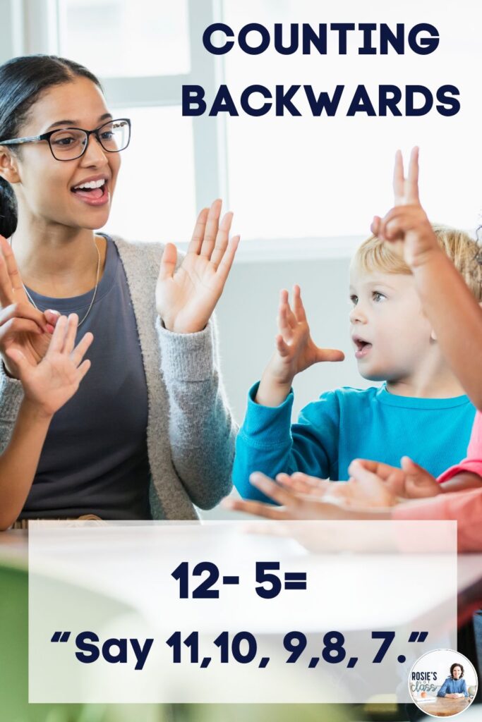 teacher helping children subtract by counting backwards