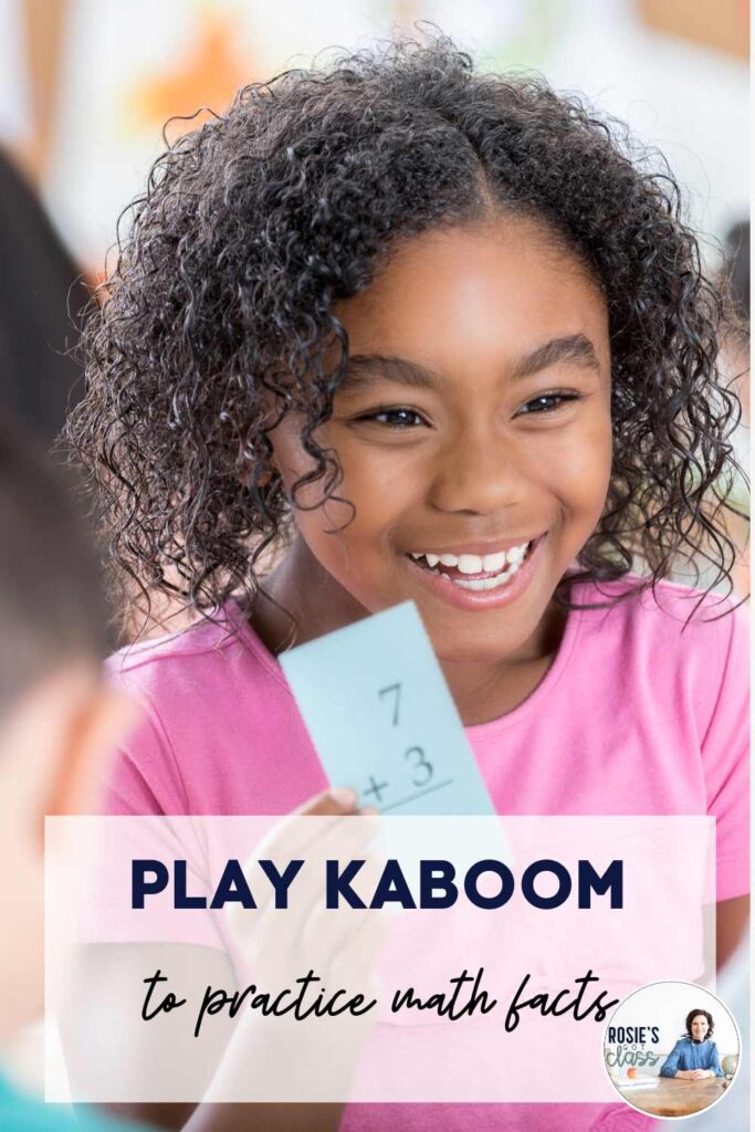 smiling girl holding a flash card and it says Play Kaboom to practice math facts