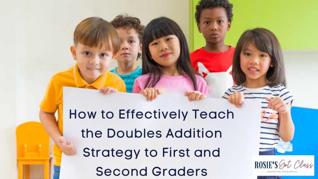 5 children in a classroom holding a white poster