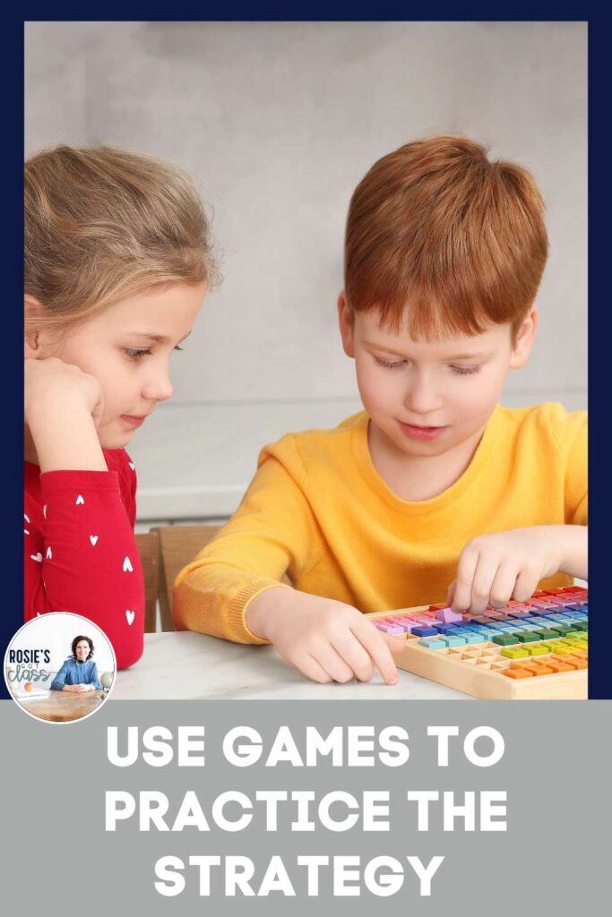 boy and girl playing a game to practice addition strategies