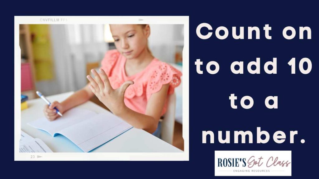 girl at a desk with notebook and blue pencil to count-on to add 10 to a number